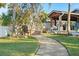Outdoor patio with fire pit and seating area at 8017 13Th S Ave, St Petersburg, FL 33707