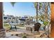 Fire pit and seating area overlooking the canal at 8017 13Th S Ave, St Petersburg, FL 33707
