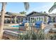 Spacious pool and patio area with seating at 8017 13Th S Ave, St Petersburg, FL 33707