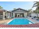 Inviting swimming pool with open-air living space at 8017 13Th S Ave, St Petersburg, FL 33707