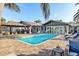 Resort-style pool with patio and lounge chairs at 8017 13Th S Ave, St Petersburg, FL 33707