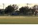 Community baseball field and park with spectator stands at 39567 Dawson Chase Dr, Zephyrhills, FL 33540