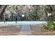 Community park features an outdoor basketball court surrounded by trees at 39567 Dawson Chase Dr, Zephyrhills, FL 33540