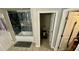 This bathroom has a tub-shower combo, neutral tile, and toilet room at 39567 Dawson Chase Dr, Zephyrhills, FL 33540