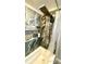 Modern bathroom shower featuring stylish tile, sleek fixtures, and a convenient built-in shelf at 39567 Dawson Chase Dr, Zephyrhills, FL 33540
