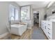 Luxurious bathroom with a freestanding tub and double vanity at 25393 Durango Ct, Punta Gorda, FL 33955