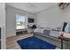 Bright bedroom with built-in window seat, plush rug, and ample natural light at 25393 Durango Ct, Punta Gorda, FL 33955