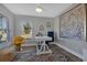 Bright home office featuring a desk, chair, and large artwork at 25393 Durango Ct, Punta Gorda, FL 33955