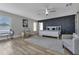 Spacious main bedroom with king-size bed and geometric wall at 25393 Durango Ct, Punta Gorda, FL 33955