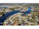 Stunning aerial view of waterfront homes on canals, showcasing the beautiful coastal community at 105 12Th Sw St, Ruskin, FL 33570