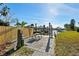 Dock area featuring boat lifts and a wooden dock with a picnic table and clear blue skies at 105 12Th Sw St, Ruskin, FL 33570