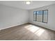 Bright and spacious bedroom with large window and neutral walls at 18315 Aintree Ct, Tampa, FL 33647