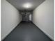 Empty garage with light, automatic door and freshly painted floor at 10412 Villa View Cir # 10412, Tampa, FL 33647