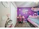 bedroom with playful decor, a study space, and storage at 12175 Phoenix Ave, Weeki Wachee, FL 34614