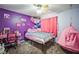 Bright bedroom featuring playful decor and a cozy sleeping nook at 12175 Phoenix Ave, Weeki Wachee, FL 34614