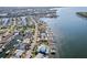 Stunning aerial view of waterfront homes with private docks along the beautiful coastline at 6354 Cocoa Ln, Apollo Beach, FL 33572