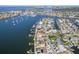 Aerial view of waterfront homes with easy access to the bay, offering stunning views and boating opportunities at 6354 Cocoa Ln, Apollo Beach, FL 33572