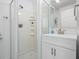 Modern bathroom with a glass-enclosed shower and a stylish vanity at 6354 Cocoa Ln, Apollo Beach, FL 33572