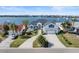 Beautiful waterfront home featuring an attached two car garage, with lovely landscaping and water views at 6354 Cocoa Ln, Apollo Beach, FL 33572