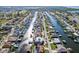 Panoramic aerial view of a waterfront community, showcasing diverse homes along winding canals at 818 Golf Island Dr, Apollo Beach, FL 33572