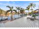 This spacious deck offers comfortable lounge chairs and water views at 818 Golf Island Dr, Apollo Beach, FL 33572