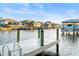 This dock has multiple pilings with boat and waterfront access at 818 Golf Island Dr, Apollo Beach, FL 33572