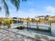 This dock has multiple pilings with boat and waterfront access at 818 Golf Island Dr, Apollo Beach, FL 33572