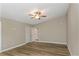 Empty bedroom with updated floors, ceiling fan and closet space at 289 Whisper Lake Rd, Palm Harbor, FL 34683