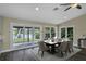 Bright dining area with beautiful view of the outdoors and updated floors at 289 Whisper Lake Rd, Palm Harbor, FL 34683