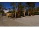 Picturesque driveway with stone accents and vibrant landscaping, enhancing curb appeal at 3225 Bluff Blvd, Holiday, FL 34691