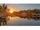 Scenic water view during sunset with reflections in the water at 3225 Bluff Blvd, Holiday, FL 34691