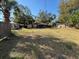 Large backyard offers plenty of space for outdoor activities and gardening at 3923 W Bay View Ave, Tampa, FL 33611