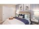 Well-appointed bedroom featuring plush bedding and stylish accents at 23819 Collina Way # 011101, Port Charlotte, FL 33980