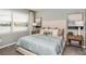Serene bedroom with a lake view, complemented by a plush bed and neutral decor at 23819 Collina Way # 011101, Port Charlotte, FL 33980