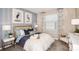 Inviting bedroom with ample natural light and serene decor at 23819 Collina Way # 011101, Port Charlotte, FL 33980