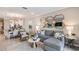 Open-concept living and dining area, featuring stylish furnishings, decor, and lots of light at 23819 Collina Way # 011101, Port Charlotte, FL 33980