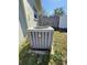 View of the home's Rheem AC unit at 5124 Brookmeade Dr, Sarasota, FL 34232