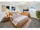 Tranquil bedroom with a wooden bed frame, stylish decor, soft natural light, and a relaxing vibe at 4508 Golfwood Blvd, Tampa, FL 33634