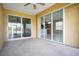 Covered lanai featuring sliding glass doors that offer views into the home's interior at 11530 57Th Street E Cir, Parrish, FL 34219