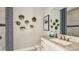 Contemporary bathroom featuring decorative wall planters and stylish fixtures at 4488 Isonzo Way, Wesley Chapel, FL 33543