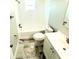 Clean, modern bath features tile floors, updated fixtures, and vanity sink at 6391 N 68Th N Ln, Pinellas Park, FL 33781