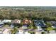 An aerial view of a community with mature trees and landscaping in a lovely neighborhood at 6977 74Th Street E Cir, Bradenton, FL 34203