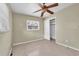 Cozy bedroom with natural light, carpet flooring and a closet at 2817 Miriam S St, Gulfport, FL 33711