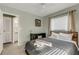 Bedroom featuring neutral-toned walls, comfortable bed, and natural lighting at 3084 Williamsburg St, Sarasota, FL 34231