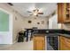 Eat in kitchen featuring a wine cooler, granite countertop and dining table at 3084 Williamsburg St, Sarasota, FL 34231