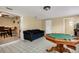 Game room with a sofa, pool table, and ample space for entertaining guests at 3084 Williamsburg St, Sarasota, FL 34231