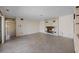 The living room features a cozy fireplace with a brick surround at 10111 Yacht Club Dr, Treasure Island, FL 33706