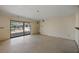 The living room features a cozy fireplace and a sliding glass door with pool access at 10111 Yacht Club Dr, Treasure Island, FL 33706