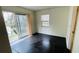 Serene bedroom features a large sliding door to the lake and a large window for natural light at 7120 Waterside Dr # 106, Tampa, FL 33617