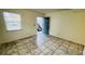 Entry view with tiled floors and a large window, offers lots of natural light at 7120 Waterside Dr # 106, Tampa, FL 33617